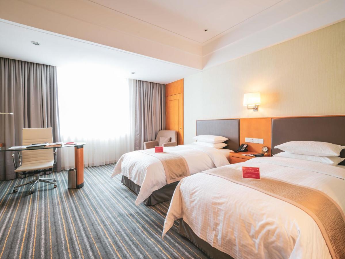 Ramada Plaza Shanghai Pudong Airport - A Journey Starts At The Pvg Airport Экстерьер фото